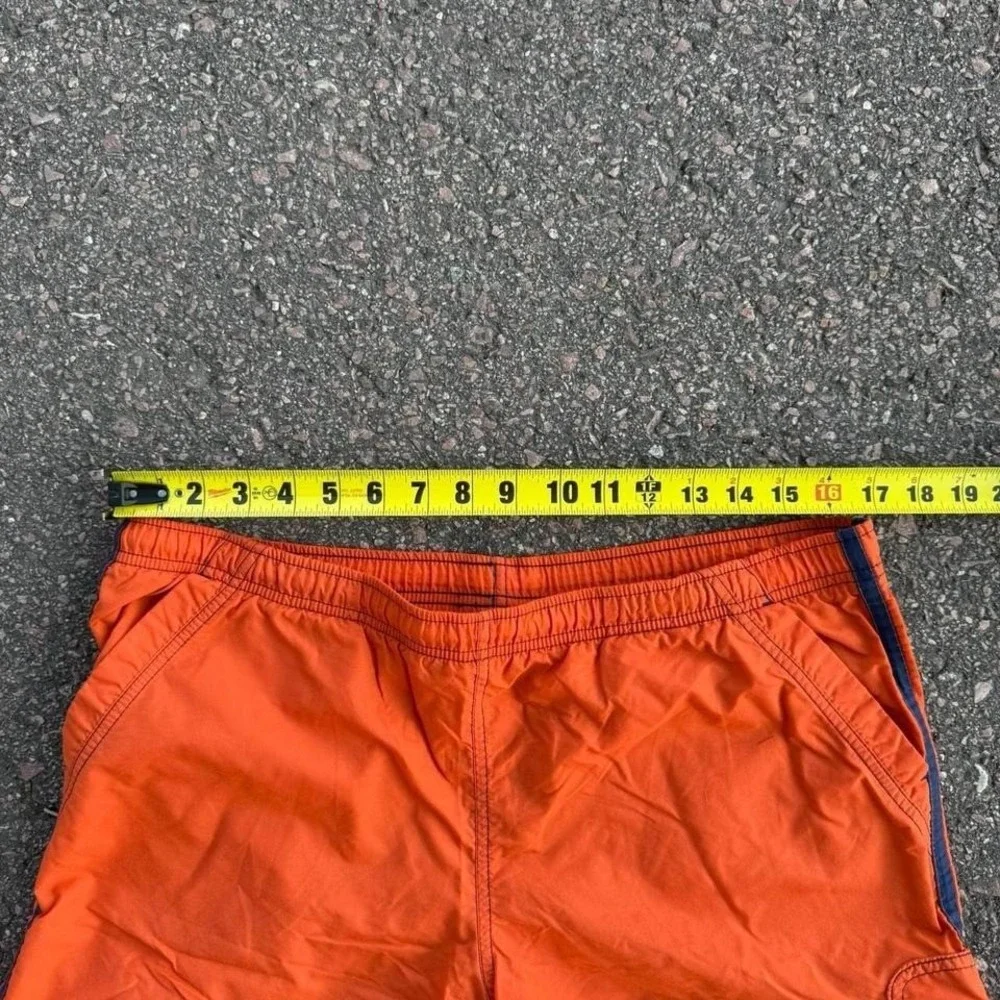 Vintage Nike orange and blue shorts Size L‎